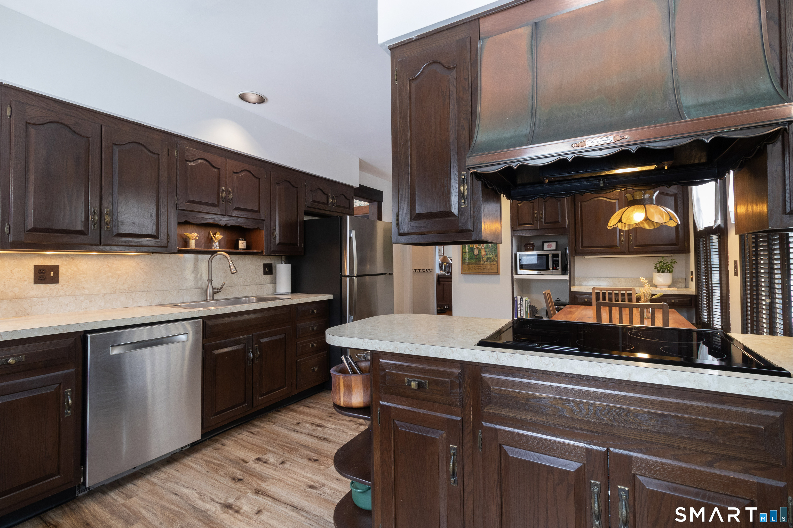 319 South Main Street Wallingford, CT 06492 - Photo 15 of 37 a kitchen with stainless steel appliances granite countertop a sink a stove and a refrigerator