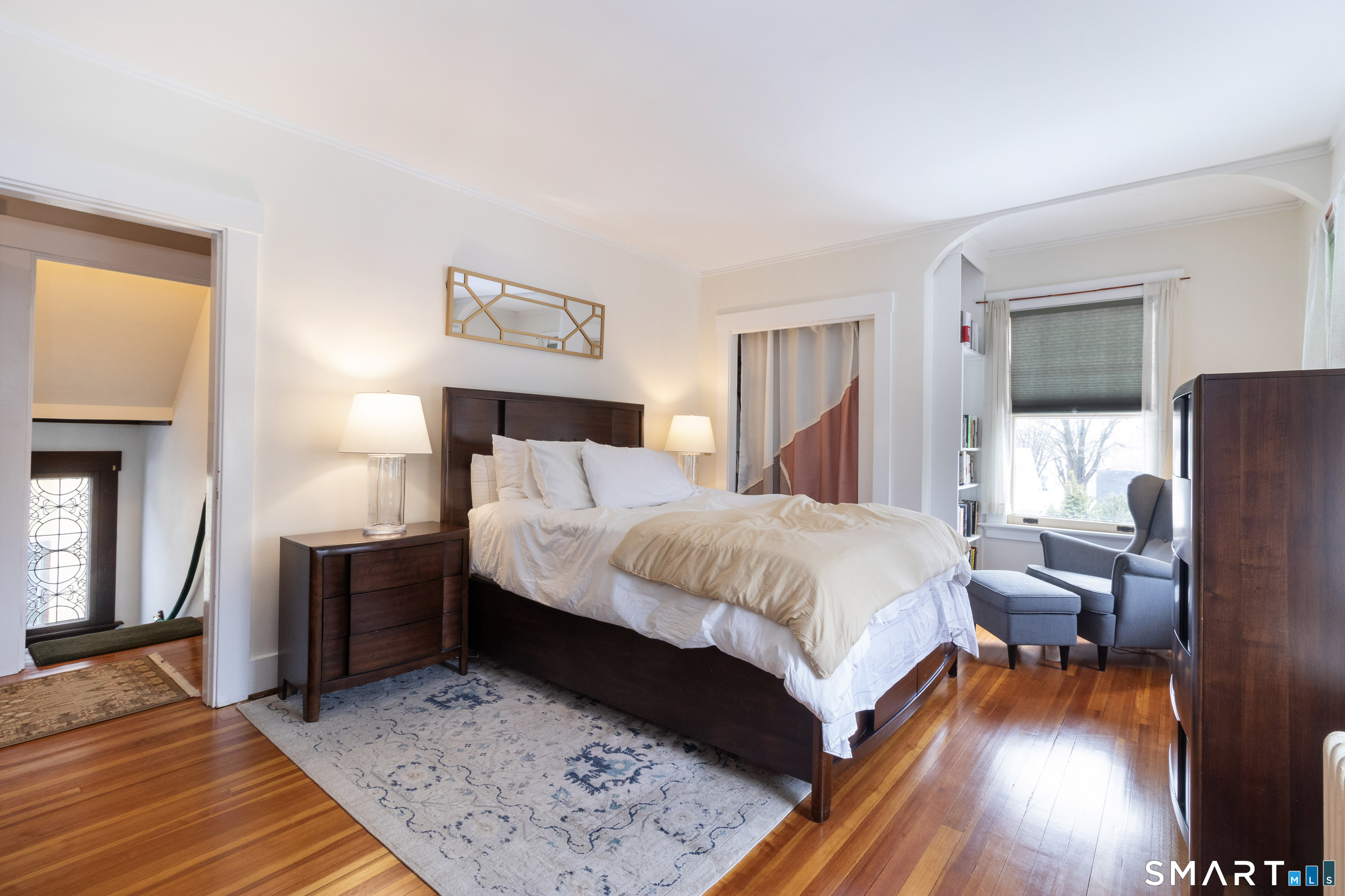 319 South Main Street Wallingford, CT 06492 - Photo 21 of 37 a bed room with a bed and a table