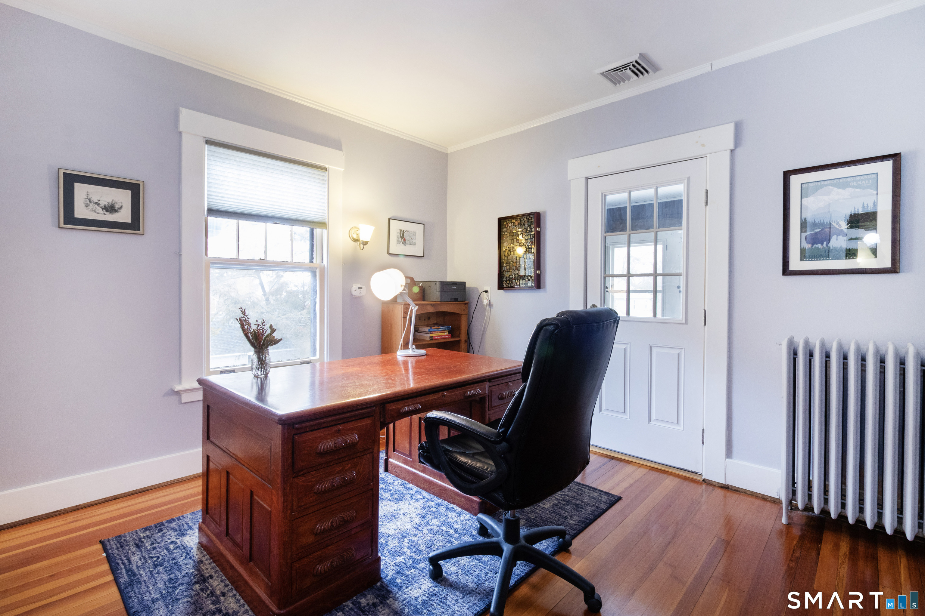319 South Main Street Wallingford, CT 06492 - Photo 22 of 37 a view of a workspace with furniture and a window