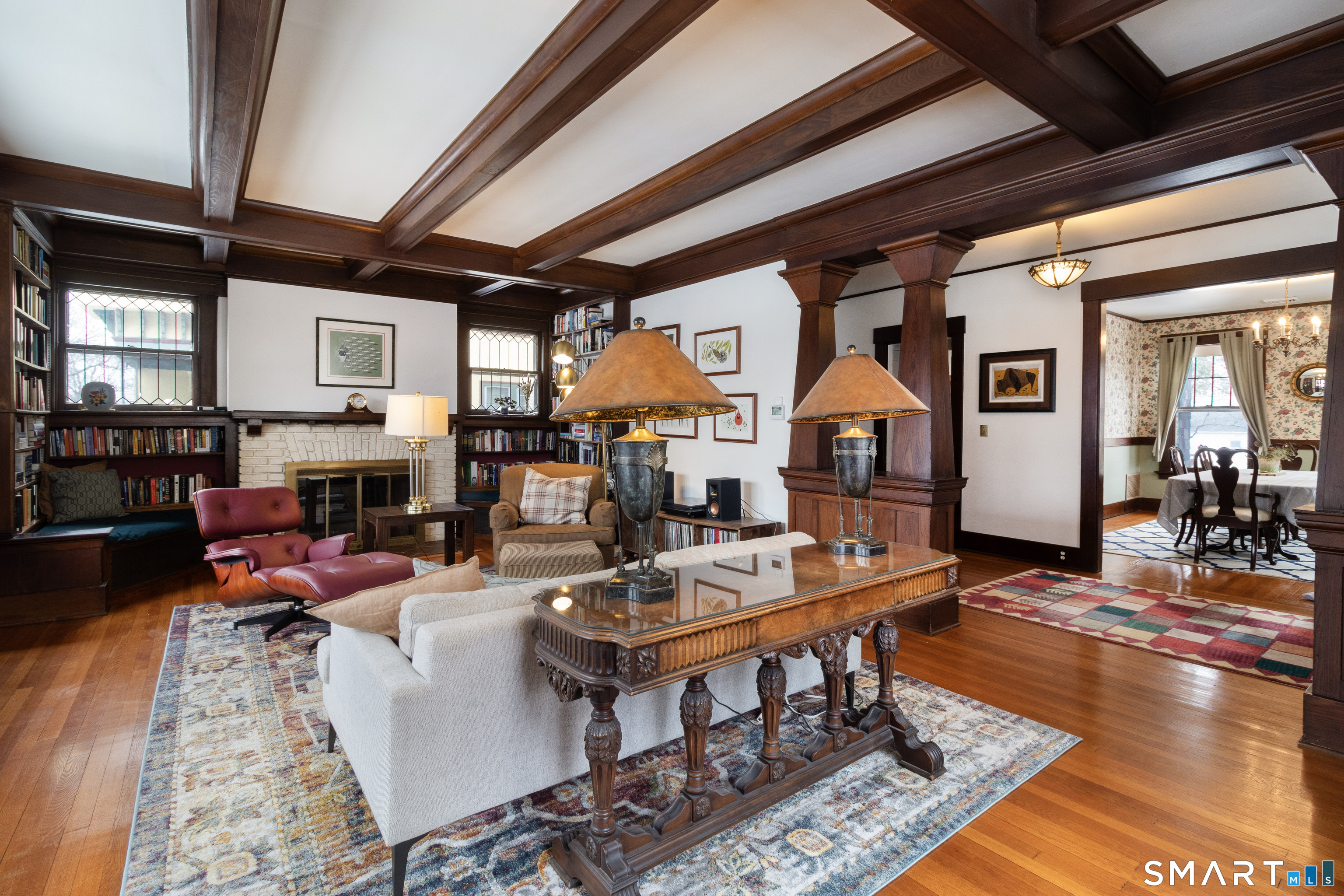 319 South Main Street Wallingford, CT 06492 - Photo 9 of 37 a living room with fireplace furniture and a wooden floor