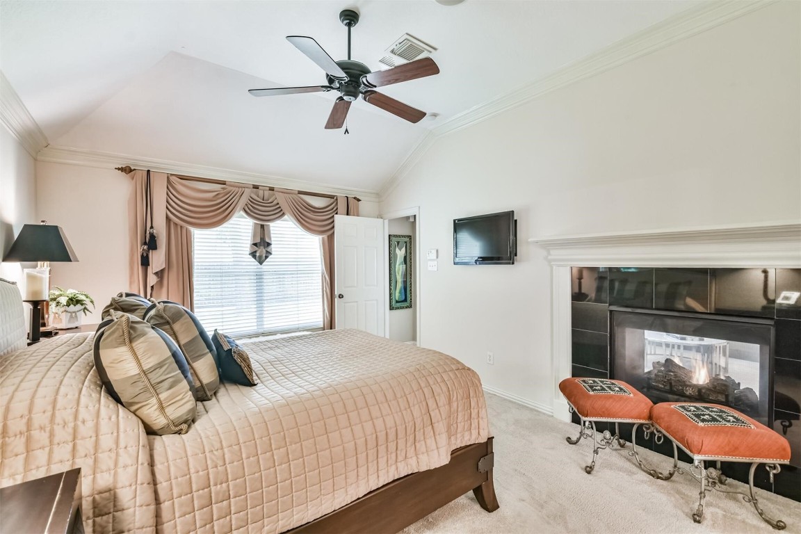 12711 Big Spring Trail Humble, TX 77346 - Photo 17 of 25 a bedroom with a bed and a chair