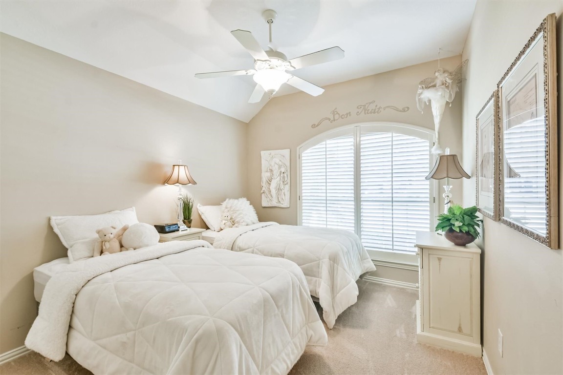 12711 Big Spring Trail Humble, TX 77346 - Photo 20 of 25 a bed room with two beds and a large window