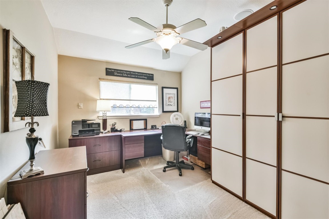12711 Big Spring Trail Humble, TX 77346 - Photo 8 of 25 a view of a workspace with furniture and a window