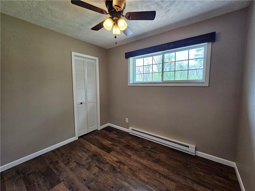 138 Center Drive Chicora, PA 16025 - Photo 15 of 25 wooden floor in an empty room with a window