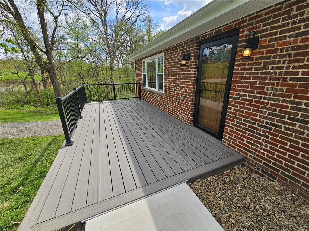 138 Center Drive Chicora, PA 16025 - Photo 3 of 25 a view of backyard with a deck