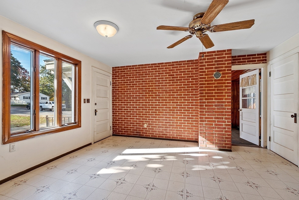 18 Middlesex Road Tyngsboro, MA 01879 - Photo 6 of 41 a view of a livingroom with a ceiling fan and window