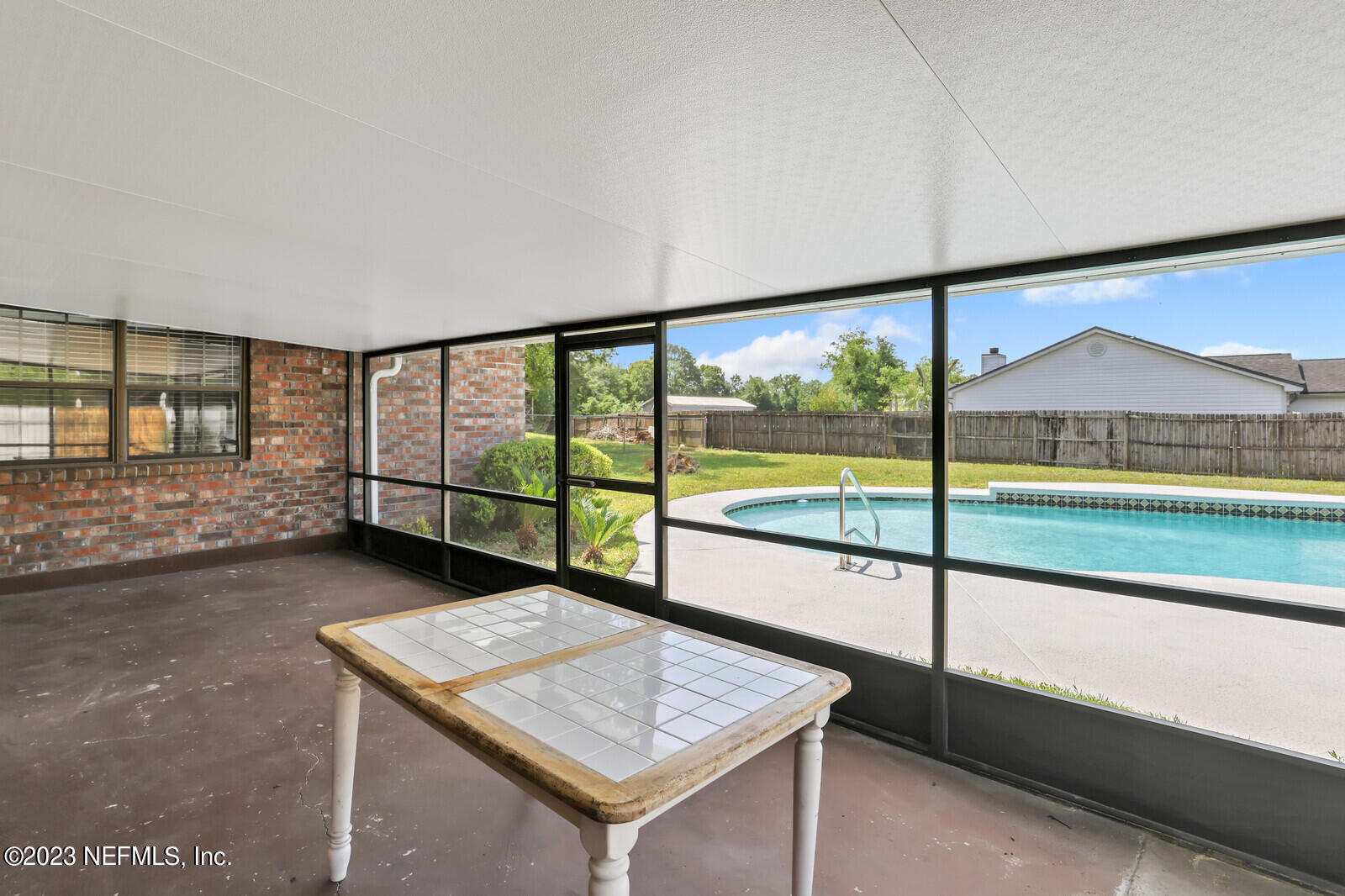 3602 Spring Lake Road Jacksonville, FL 32210 - Photo 22 of 27 Screened in Patio
