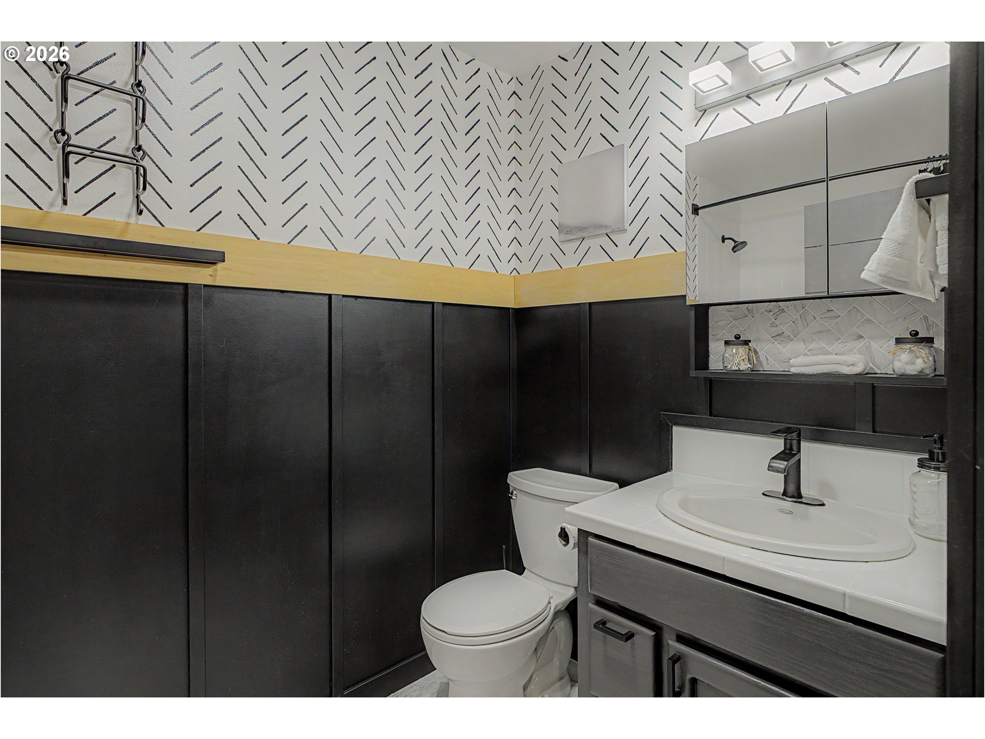 16515 Highway 47 Banks, OR 97106 - Photo 18 of 48 a bathroom with a sink a toilet and mirror