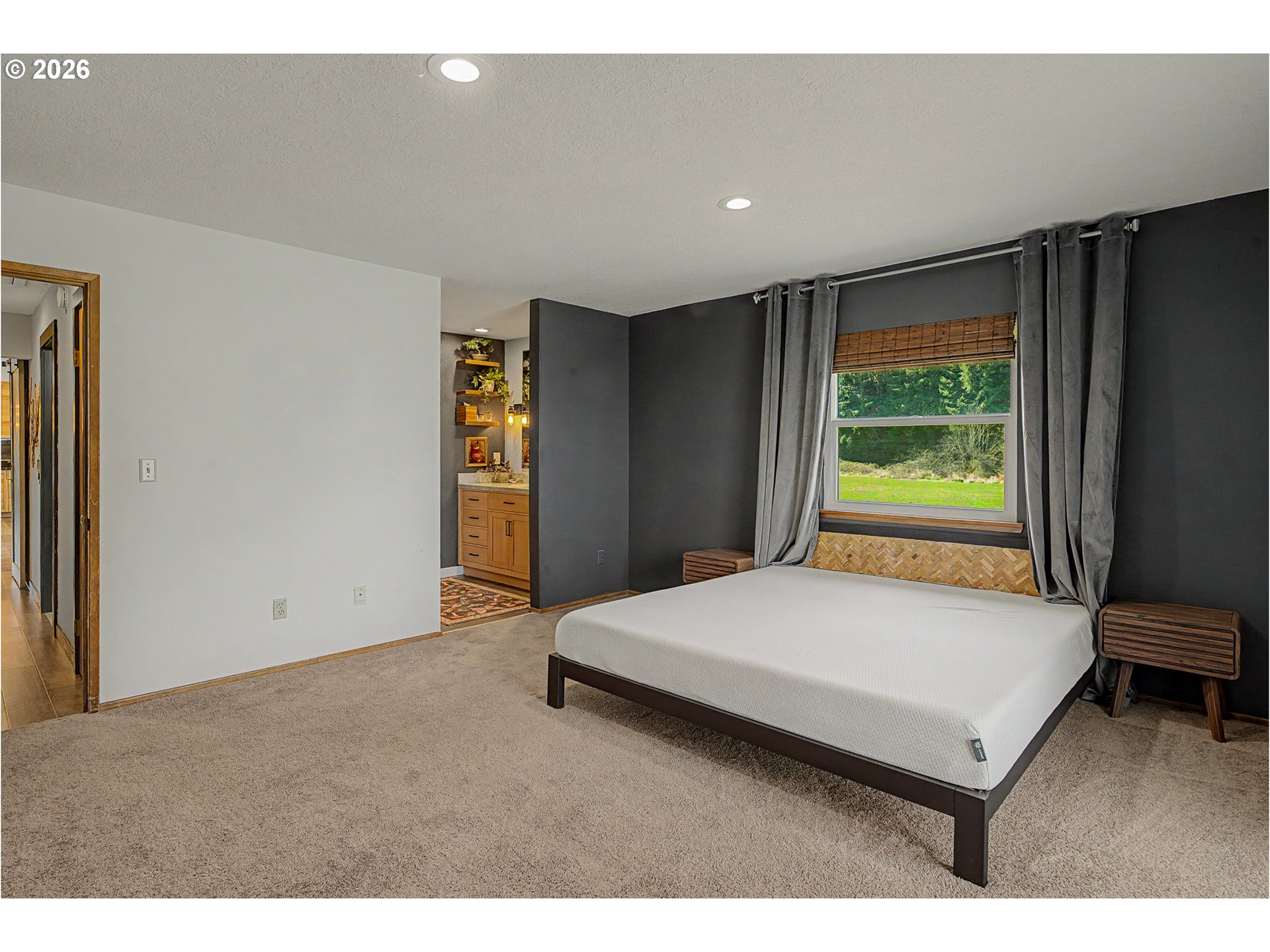 16515 Highway 47 Banks, OR 97106 - Photo 25 of 48 a bedroom with a bed and a window