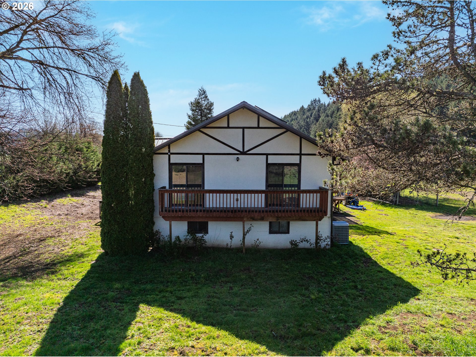 16515 Highway 47 Banks, OR 97106 - Photo 40 of 48 a view of a house with a yard potted plants and large tree