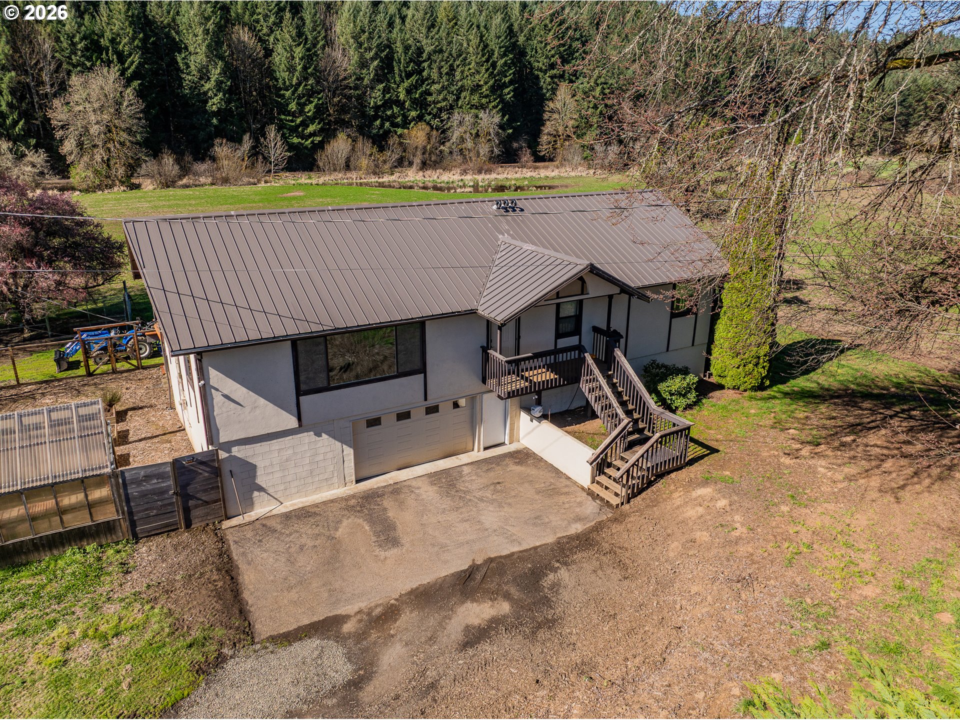 16515 Highway 47 Banks, OR 97106 - Photo 41 of 48 front view of a house with a yard and furniture