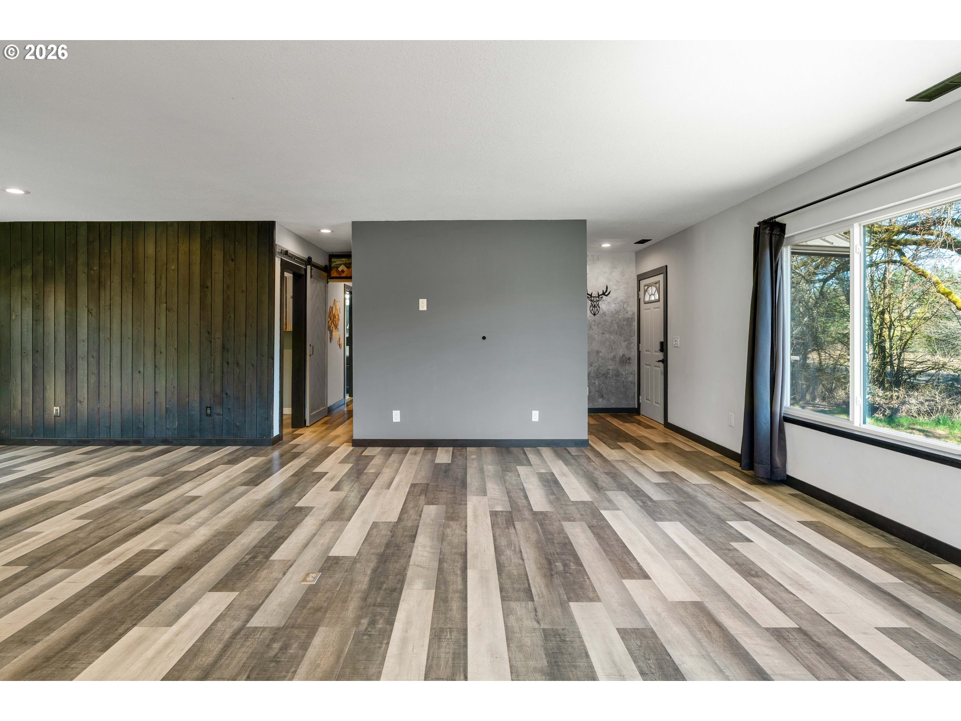 16515 Highway 47 Banks, OR 97106 - Photo 7 of 48 en empty room with window and outdoor view