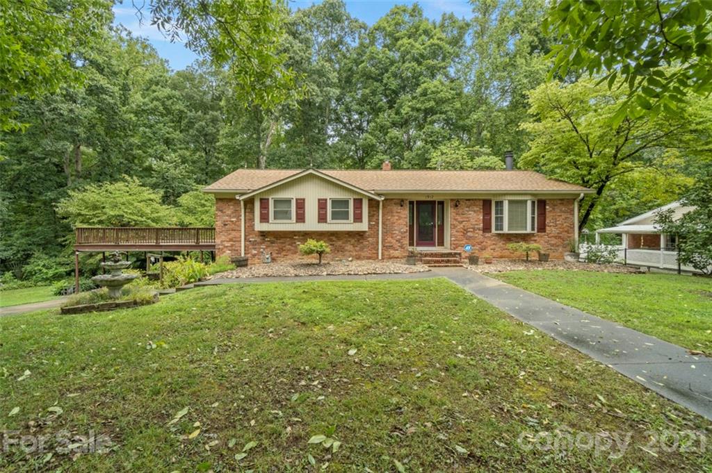 1912 Normandy Road Kannapolis, NC 28081 - Photo 2 of 43 a front view of a house with a yard table and chairs