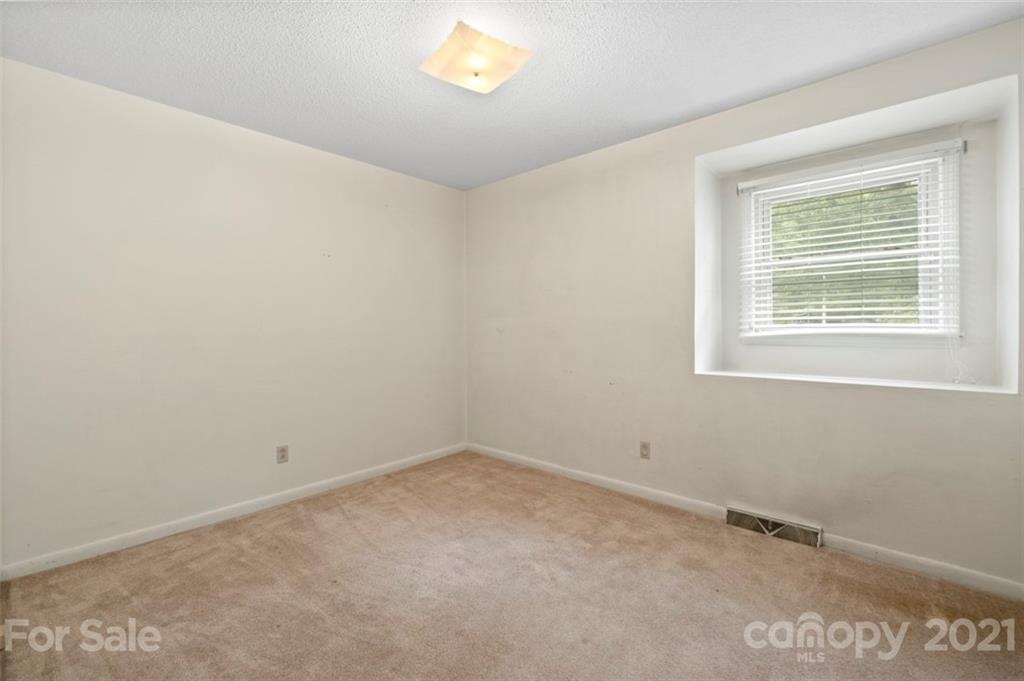 1912 Normandy Road Kannapolis, NC 28081 - Photo 16 of 43 an empty room with a window