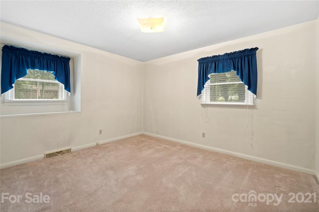 1912 Normandy Road Kannapolis, NC 28081 - Photo 18 of 43 a view of an empty room with a window