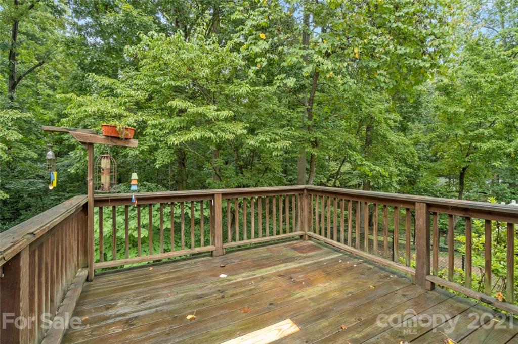 1912 Normandy Road Kannapolis, NC 28081 - Photo 24 of 43 a balcony with trees in front of it