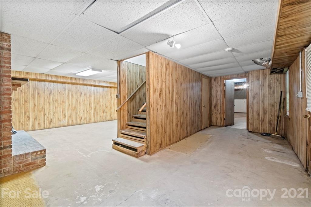 1912 Normandy Road Kannapolis, NC 28081 - Photo 25 of 43 a view of an empty room with stairs