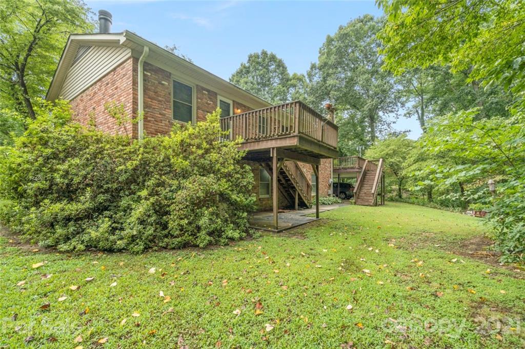 1912 Normandy Road Kannapolis, NC 28081 - Photo 4 of 43 a view of a house with backyard and garden