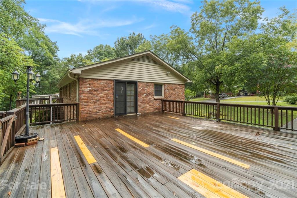 1912 Normandy Road Kannapolis, NC 28081 - Photo 33 of 43 a view of a house with wooden floor next to a yard