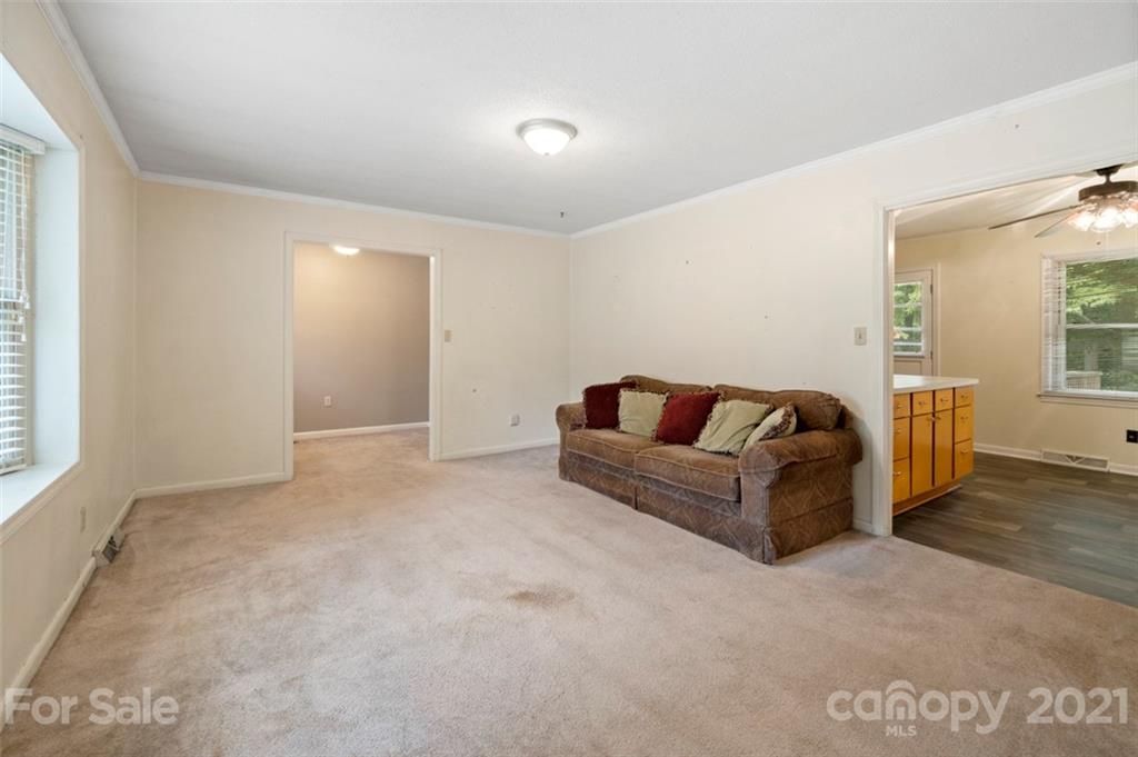 1912 Normandy Road Kannapolis, NC 28081 - Photo 5 of 43 a living room with furniture and a flat screen tv
