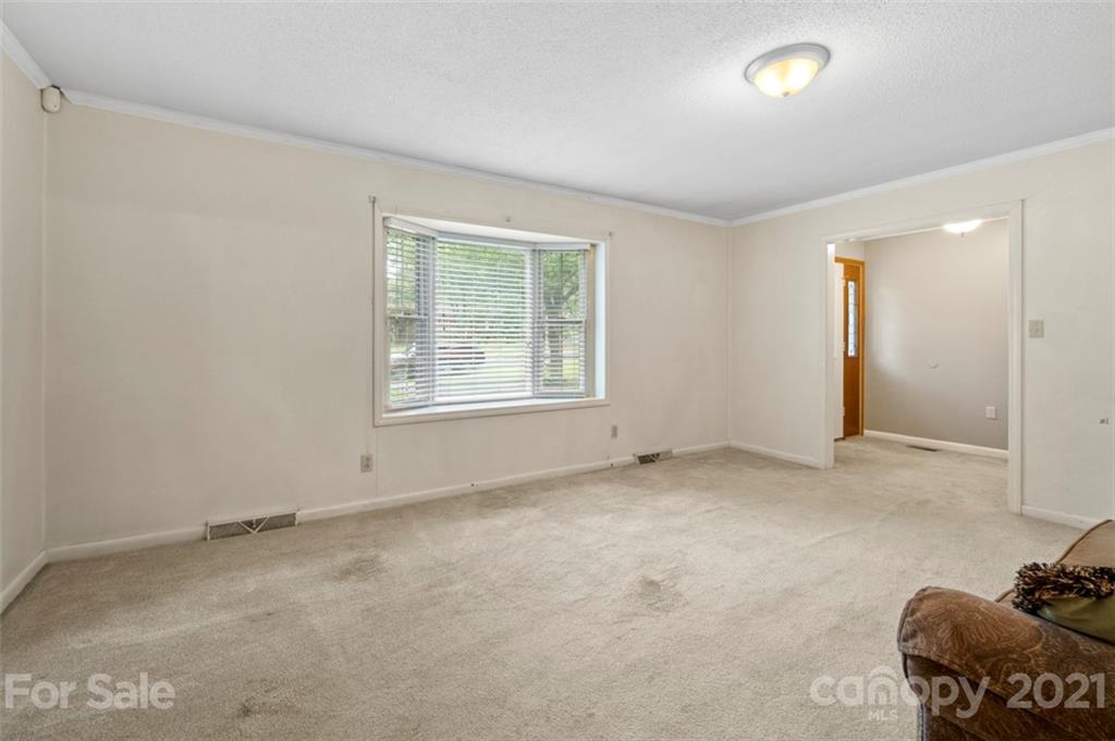 1912 Normandy Road Kannapolis, NC 28081 - Photo 6 of 43 an empty room with a window