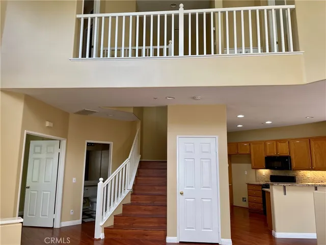 a view of a livingroom with furniture and wooden floor