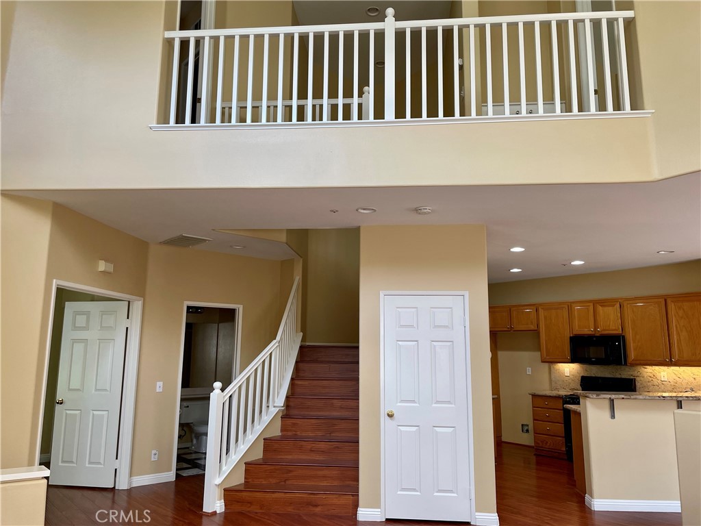 149 Islington Irvine, CA 92620 - Photo 11 of 15 a view of a livingroom with furniture and wooden floor