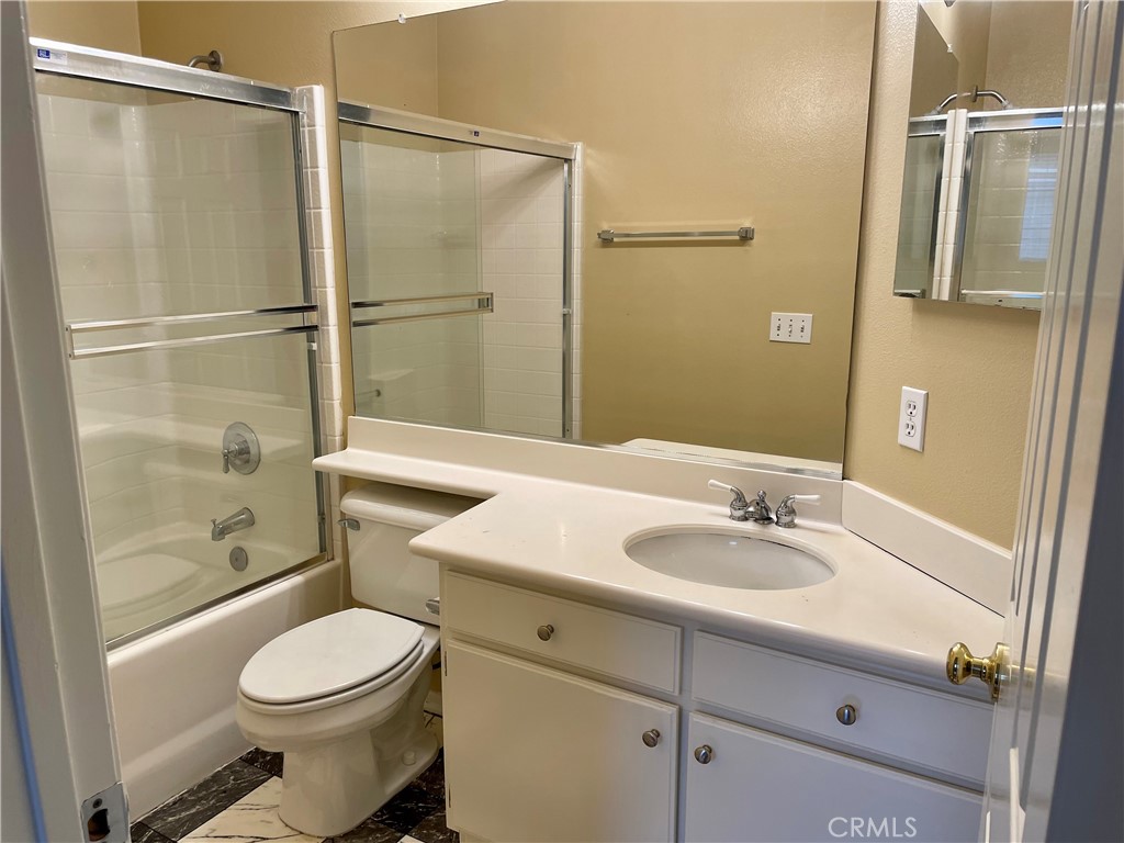149 Islington Irvine, CA 92620 - Photo 15 of 15 a bathroom with a sink toilet and shower
