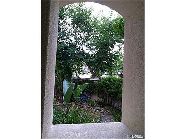 149 Islington Irvine, CA 92620 - Photo 4 of 15 a view of a window with a tree