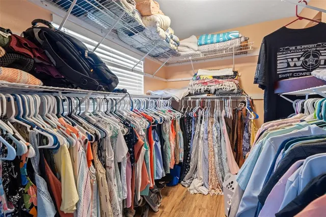 a view of a kitchen with a sink and cabinets