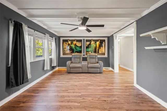 a view of a house with wooden floor and a sink
