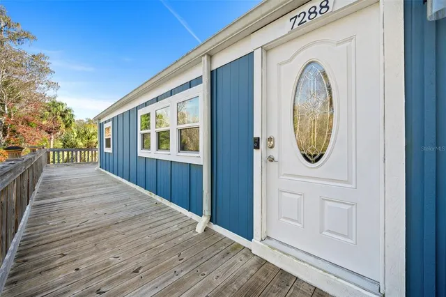 a view of a porch with a yard
