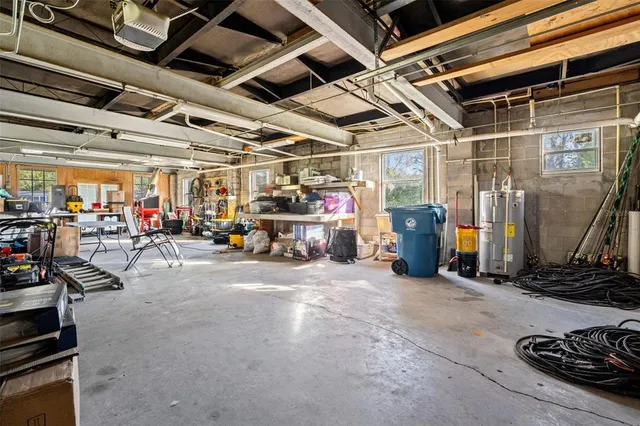 a view of a yard with an outdoor seating