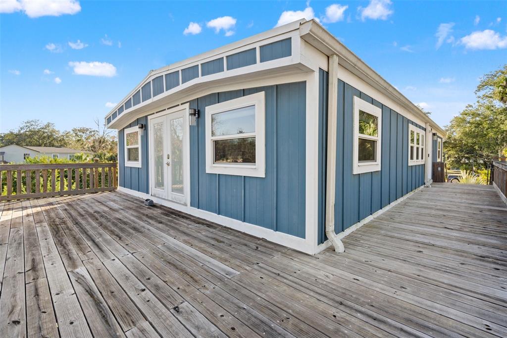 7288 Coventry Court Weeki Wachee, FL 34607 - Photo 50 of 82 a view of a house with a porch