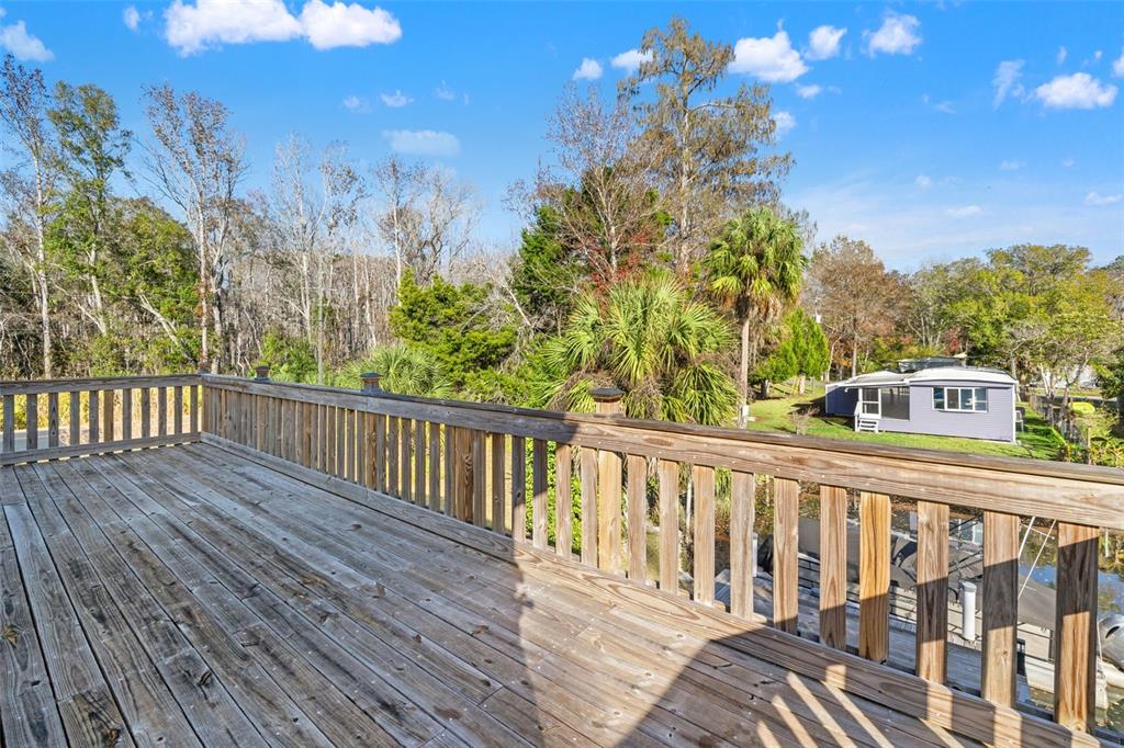 7288 Coventry Court Weeki Wachee, FL 34607 - Photo 53 of 82 a view of a wooden bridge