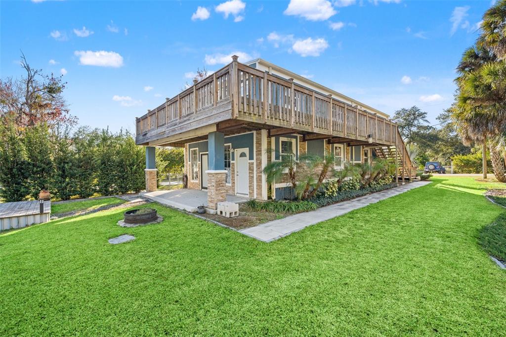 7288 Coventry Court Weeki Wachee, FL 34607 - Photo 57 of 82 a front view of house with a garden