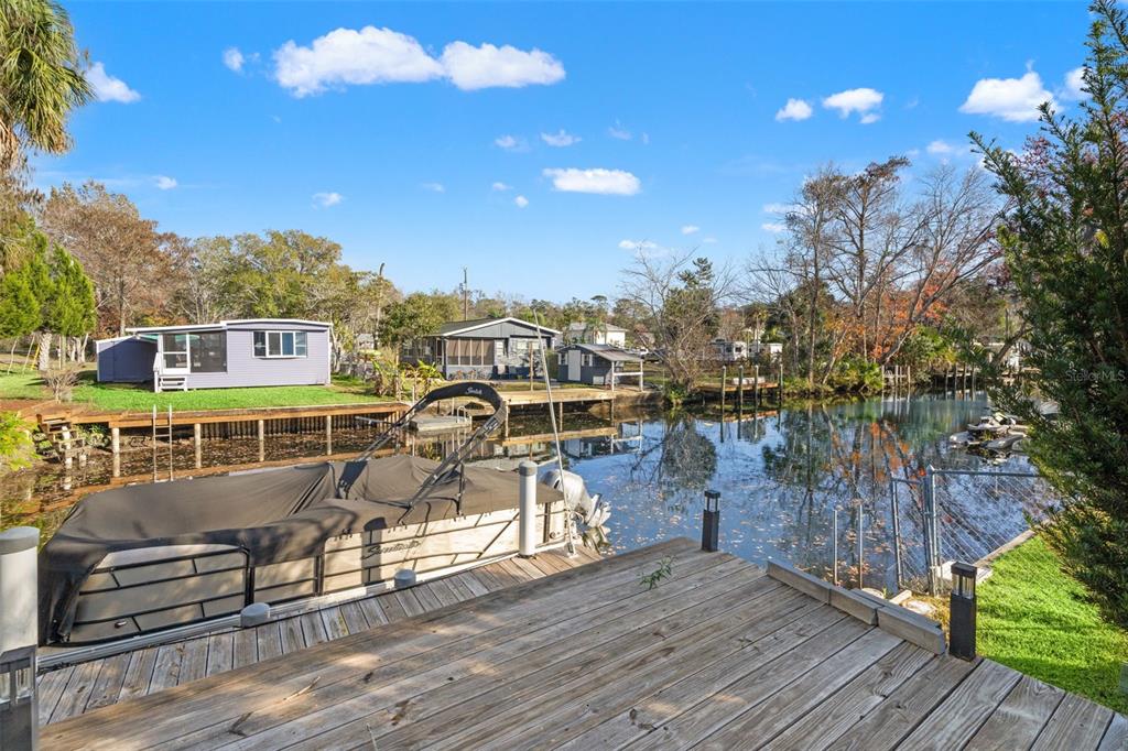 7288 Coventry Court Weeki Wachee, FL 34607 - Photo 61 of 82 a view of a balcony with chairs