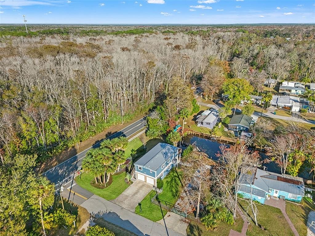 7288 Coventry Court Weeki Wachee, FL 34607 - Photo 74 of 82 a view of a yard with an outdoor seating