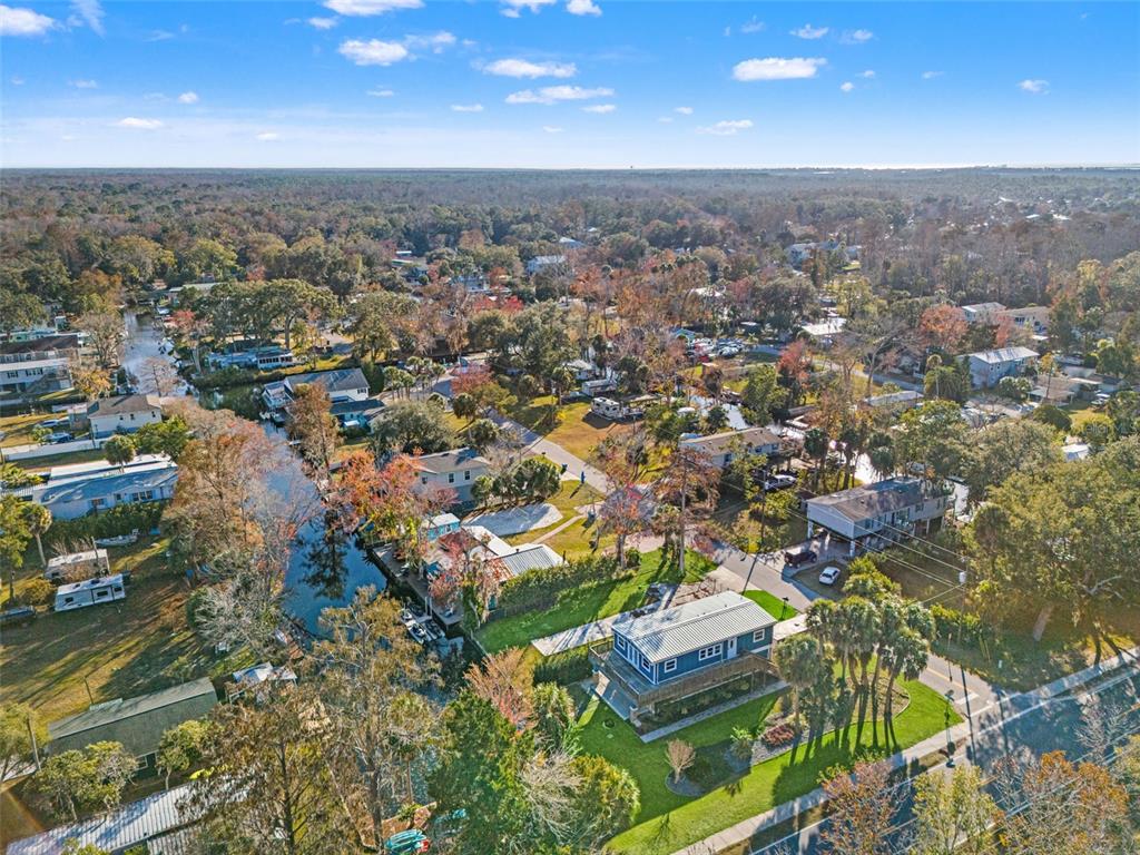 7288 Coventry Court Weeki Wachee, FL 34607 - Photo 78 of 82 an aerial view of residential houses with outdoor space