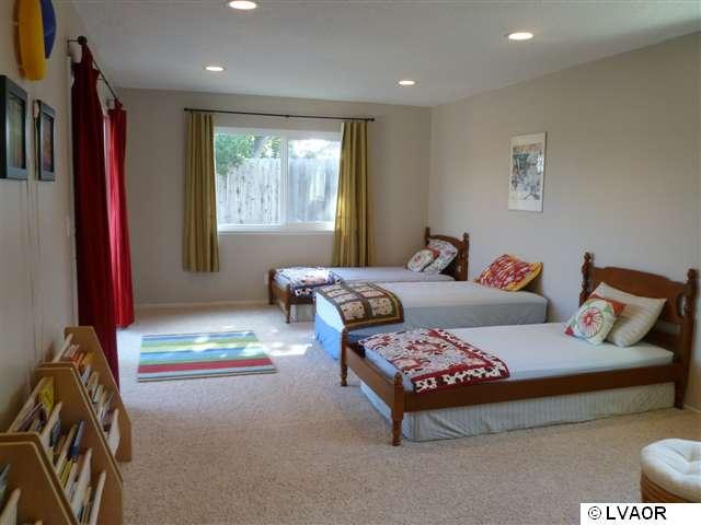 3976 Constellation Road Lompoc, CA 93436 - Photo 5 of 9 a bedroom with a bed and window