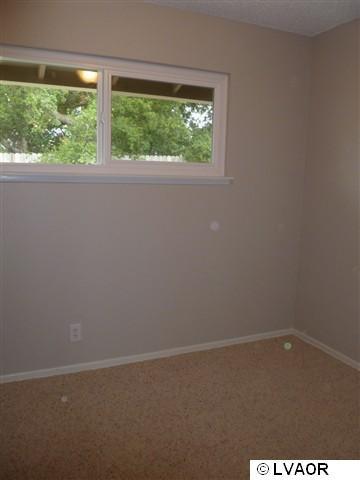 3976 Constellation Road Lompoc, CA 93436 - Photo 7 of 9 an empty room with a window
