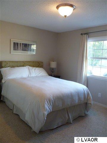 3976 Constellation Road Lompoc, CA 93436 - Photo 8 of 9 a bedroom with a bed and window