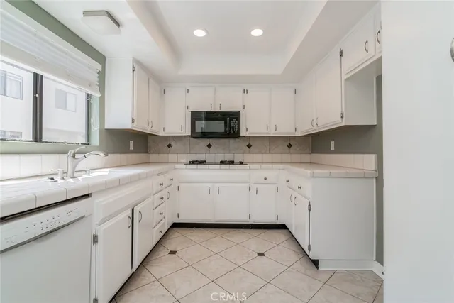 a kitchen with sink cabinets and a sink