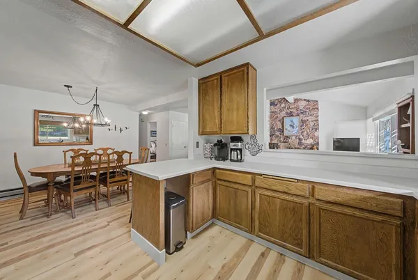 a kitchen with a stove and a microwave