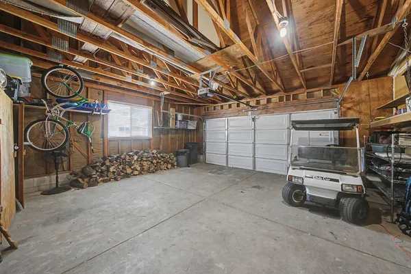 a view of a chairs and table in patio