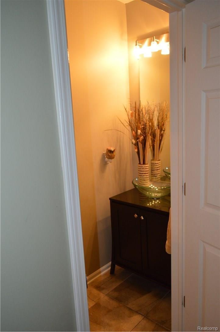 742 Caribou Court Rochester, MI 48307 - Photo 17 of 58 First floor lav off kitchen area