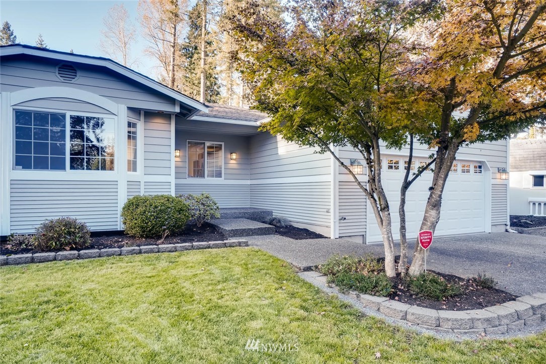 22007 4th Avenue Southeast Bothell, WA 98021 - Photo 3 of 22 a front view of a house with garden