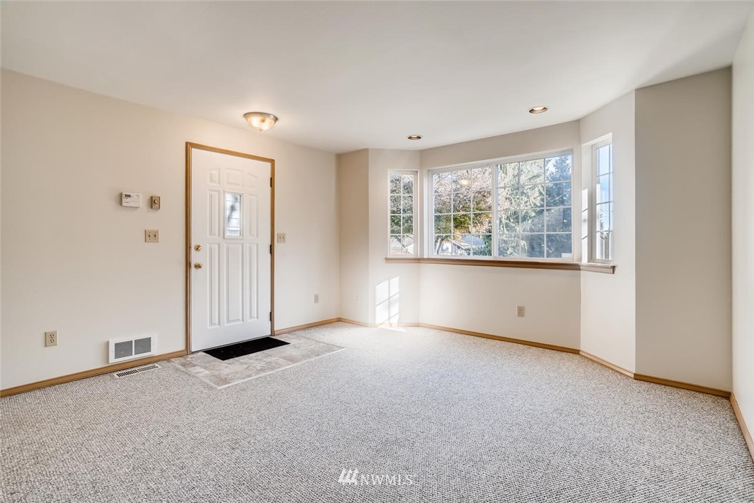 22007 4th Avenue Southeast Bothell, WA 98021 - Photo 4 of 22 a view of an empty room with a window