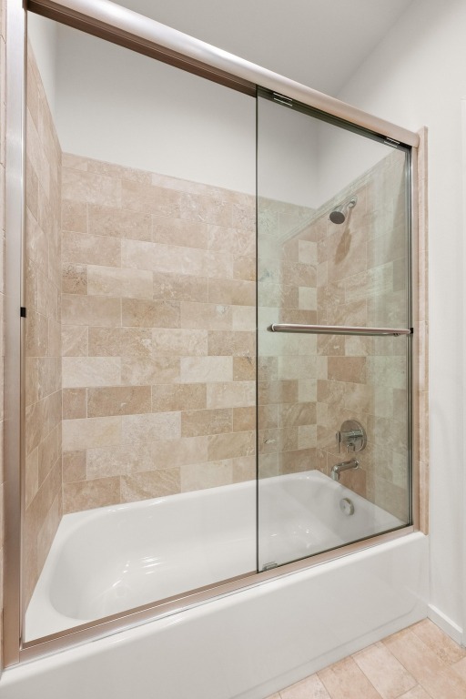 1600 Barton Springs Road, Unit 5601 Austin, TX 78704 - Photo 24 of 36 a bathroom with a bathtub and a shower