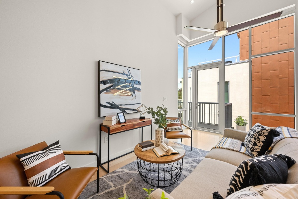 1600 Barton Springs Road, Unit 5601 Austin, TX 78704 - Photo 5 of 36 a living room with furniture a rug and a window